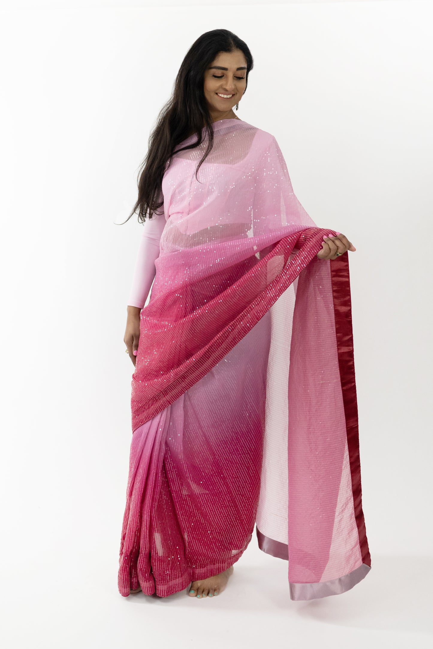 Ready to wear intricate embroidery on a vibrant red Crimson Splendour Faux Georgette Saree, showcasing fine craftsmanship and elegant design