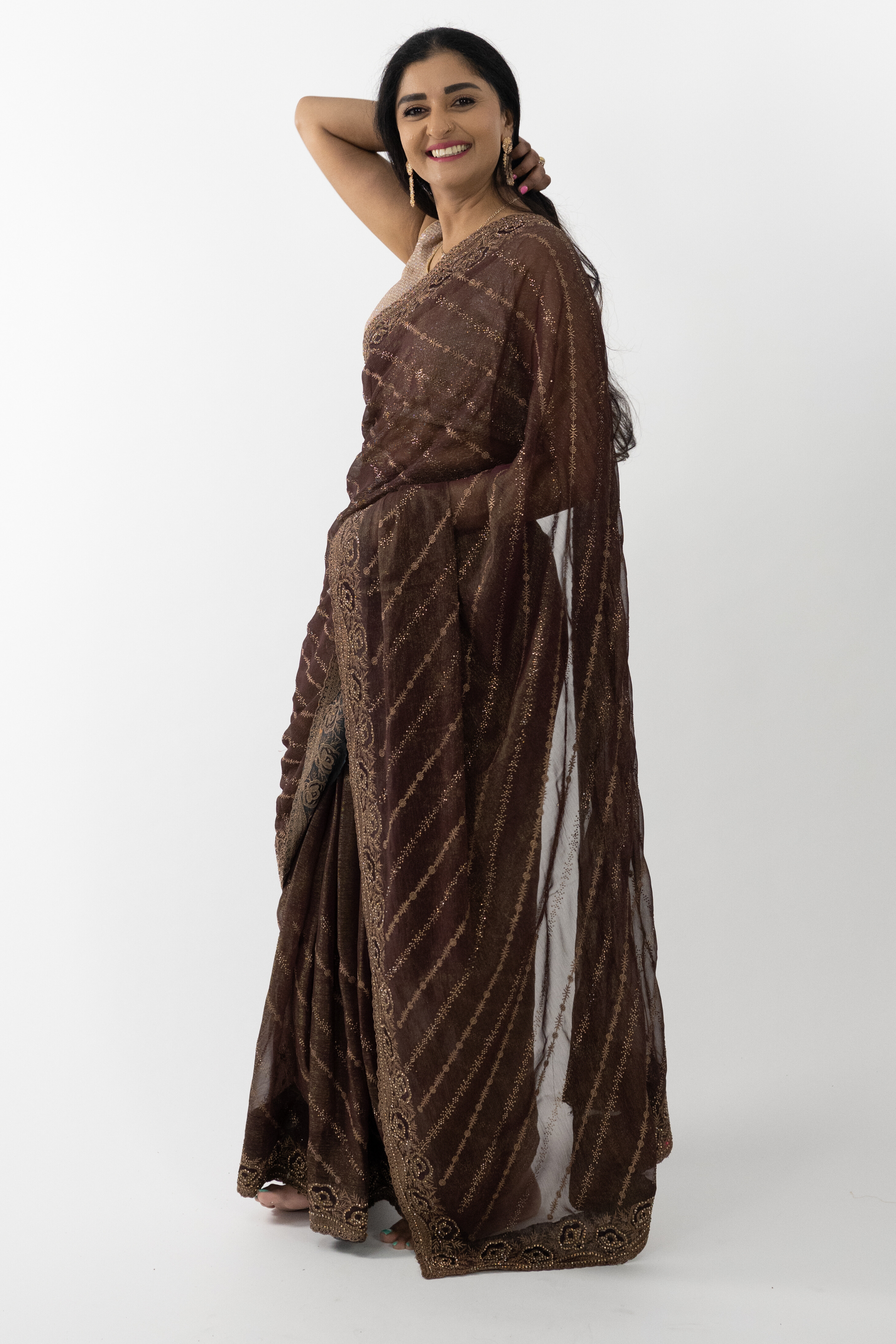  Bronze Simar Silk Saree, showcasing the fine craftsmanship and rich texture of the Simar silk fabric.