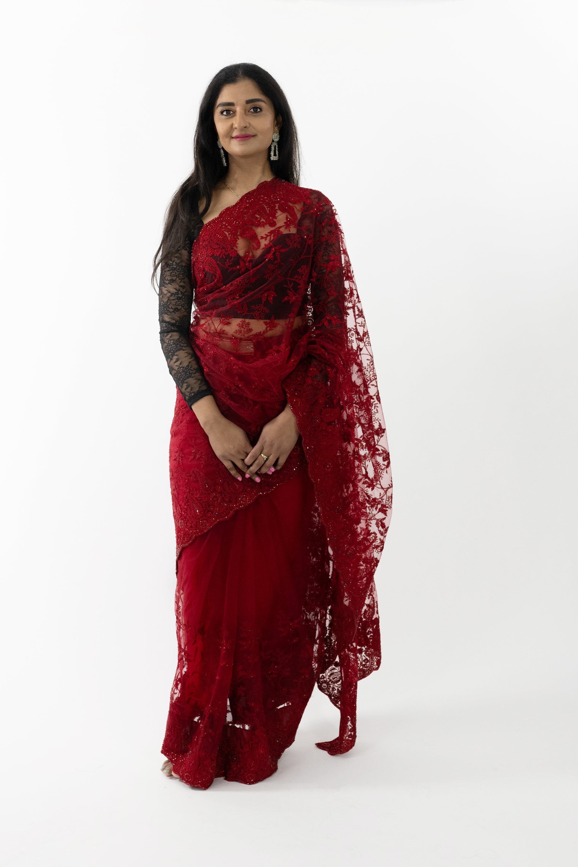 model showcasing the front view of a vibrant red Butterfly Radiance Net Saree with intricate butterfly detailing, perfect for special occasions