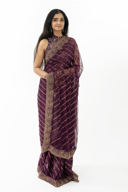 Premium Simar Silk Fabric: Renowned for its rich texture and elegant drape, this silk fabric adds a touch of opulence to your ensemble, ensuring you stand out with grace and style.
Intricate Embroidery: Featuring delicate and meticulous embroidery, this saree showcases fine craftsmanship that adds a layer of sophistication and beauty to your look.